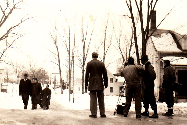Filming people walking to Town Meeting in Pittsford in 1950