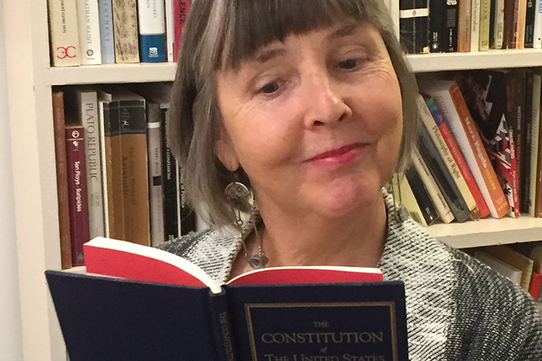 Political theory professor Meg Mott with the Constitution
